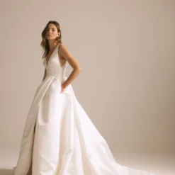 Benton -Bridal Shop NouvelleAmsale Bridal BENTON R440S DuchessSatin Sleeveless Plunge V Neck V Back Slit WrapSkirt Pockets A LineGown Side scaled